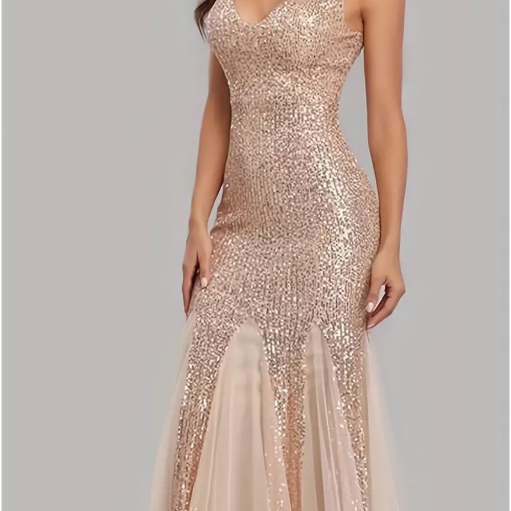 Champagne colored formal dress. 2XL in size. Brand new with tags. 50$